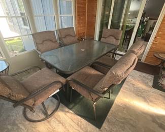 Patio set with 2 swivel chairs and 4 non-swivel chairs.
Umbrella available separately.