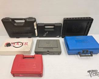 3460  6 Gun Cases, 1 Ruger Box  1 Gun Lock with Keys 