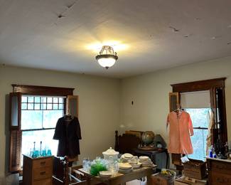 vintage twin bed, dishes, 1940s/ 1950s clothes and coats, glassware, vintage end tables and dressers