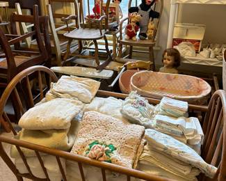 vintage bassinets, baby blankets, toys, baby shoes, etc