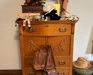 vintage hats, gloves, scarves, leather bags, curling irons, mini perfume bottles, lucite grapes, handkerchiefs, wicker plant stand