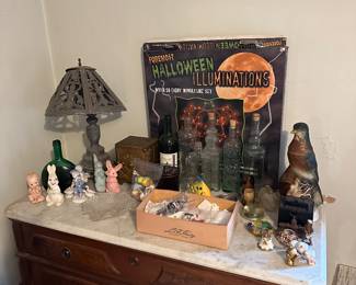 marble dresser, holiday decor, glass miniature animals, old bottles