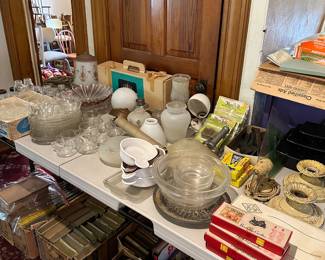 antique/ vintage books, glassware, wall sconces, glass light fixtures