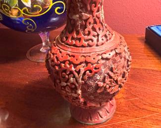 Small carved cinnabar vase