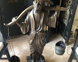 Tall Sculpture of Water Bearer