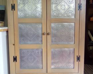 Reproduction Pie Safe.  It is an excellent condition solid wood, measuring 58 in tall 38 and 1/2 in wide and 13 in deep. First $150 takes it home. Call me 386-405-1867