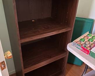  #38	laminate bookcase with 2 shelves 25x18x48	 $30.00 
