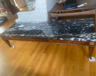 #9	mc marble top coffee table on wheels 60x20x14	 $30.00 			
