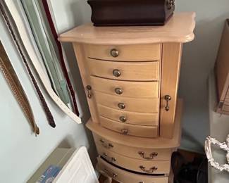 #56	Jewelry cabinet with 8 drawers and 2 slide out doors 19x15x42	 $75.00 

