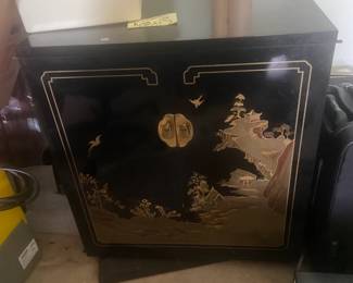 #163	Asian Black Lacquer painted Cabinet w/old Style TV inside and swivels - 29x17x32	 $20.00 			

