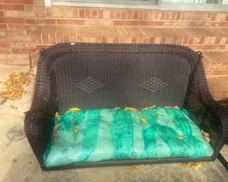 #166	Brown Plastic wicker Swing - 54"L w/chains	 $75.00 			
