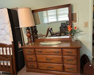 #27	Sumpter dresser with 9 drawers 60x19x31, mirror is 47x37	 $125.00 
