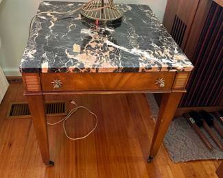 #7	pair of mc marble top end table with one drawer on wheels 22x24x22	 $125.00 
#8	mc white brass and glass wheat lamp 35 inches tall	 $100.00 
