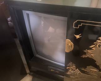 #163	Asian Black Lacquer painted Cabinet w/old Style TV inside and swivels - 29x17x32	 $20.00 			
