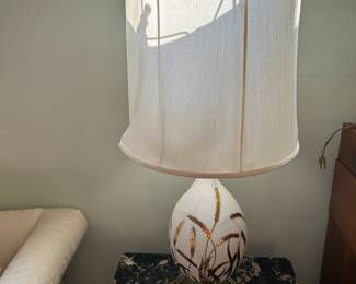 #7	pair of mc marble top end table with one drawer on wheels 22x24x22	 $125.00 
#8	mc white brass and glass wheat lamp 35 inches tall	 $100.00 
