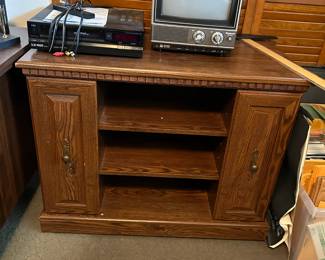#23	TV stand with 2 pull out shelves for CDs 36x17x28	 $35.00 
