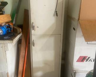 #155	Metal 2 door Cabinet w/4 Shelves - 18x13x64	 $75.00 			
