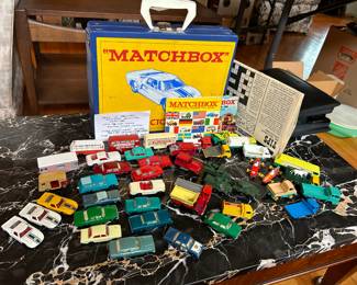 #106	1960s Lot 1966& 1967 Match Box Collector NO 41 Case w/42 cars Trucks, Military, Busses, Campers Extra Wheels & Misc. Incl. - 1966 & 196 Catalogs & Newsletters Made in England by Lesney	 $150.00 
