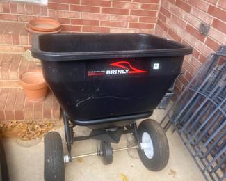 #171	Brinly Spreader - Hooks Behind Riding Mower	 $110.00 			
