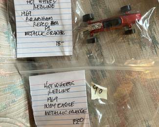 #98	Hot Wheels Redline 1969 Indy Eagle Metallic orange, & 1969 Brabham Redco P1 Metallic orange	 $33.00 
