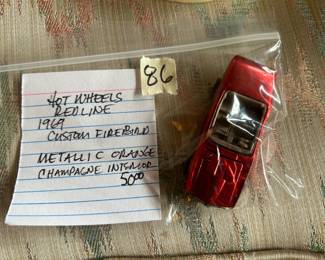 #86	Hot wheels redline 1969 custom firebird metallic orang champagne interior	 $50.00 
