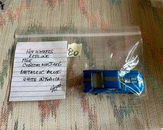 #80	Hot wheels redline 1963 custom mustang metallic blue white interior	 $40.00 
