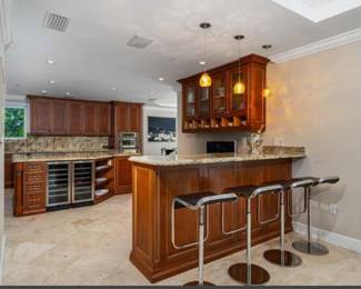 4 Modern Black Stools (reportedly purchased at Baker - there are 10 in the house)