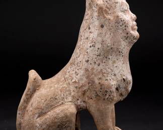 Tang Dynasty Mingqi Earth Spirit Tomb Guardian - Private Museum Estate Collection
Chinese, Tang Dynasty (618 AD to 906 AD) A semi-human earth spirit figure seated on it's haunches with cloven hooves planted firmly on the base. it's expressive face peering upward with a placid facial expression.Some traces of pigment to the body. The earth spirits have been believed to protect the living by keeping the spirits of the dead from inappropriately roaming the world outside the tomb.

Measure: Height 13.5 inches x width: 6.5 inches x depth 6.5 inches.

Condition: Excellent. There appears to be no repairs or damage to the figure.  

Provenance: ex-William L. Parker heirloom collection, Naples, Florida, USA - inheritance from 1800s.