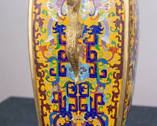 Qing Dynasty - Qianlong Cast Bronze Rectangluar Cloisonne Dragon Vase with dragon handles,of square section with four sides are supported on a  flared foot, and surmounted by a waisted neck of the same section, brilliantly decorated in bright cloisonné enamels on a yellow-ground.
H: 34.5, W: 15, L: 31 CM