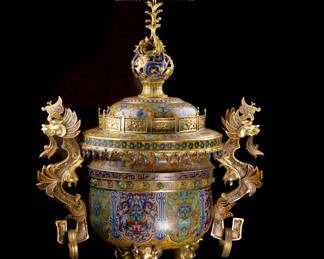 An 18th Century (1700s) Magnificent (Very Large - 5.6 ft high) Imperial Qianlong Qing Dynasty Cast Gilt Bronze Cloisonne Incense burner Censer Vase. Very large and used in formal halls or throne rooms. One of a matching pair (lot M001B). This censer has a dragon motif and decorative elements found in the handles, design, and ornamental top, as well as inlaid gem stones. Both dragons and phoenixes are heavily associated with the imperial family, to the extent that the throne upon which the emperor sat was referred to as the dragon throne, and are also often depicted side by side in art, whether that be paintings or pottery, and even in how they relate to the imperial family.

To be in the presence of these massive ceremonial censers, which are rarely seen by outsiders, was breathtaking and humbling. These are true treasures worthy of any museum or grand estate.
H: 170.7, TOP: 89, BOTTOM: 88, W: 94, FOOT: 43, D: 172