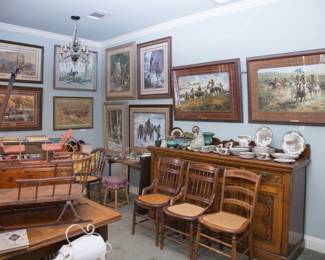 Western framed prints seen in this picture priced from $90.00 - $650.00. Artists: H. Terpening, T. Cox, K. Riley and prints from the Connally Collection.