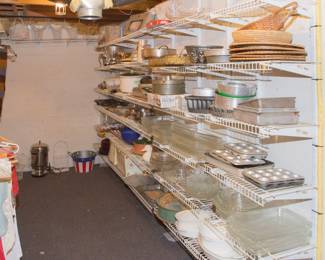 In the basement we have this closet filled with linens and baking dishes.