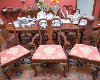 Queen Anne style dinning table and chair set.  2 capt. and 6 guest chairs (29"h x 106" l x 44"w [w/2  20" leaves]:  $800.00