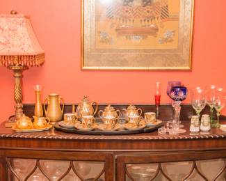 Top of curio cabinet items priced from: $4.00 - $320.00. Vtg. Japanese hand printed tea set (8 pcs.): $320.00