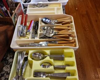 Three sets of eating utensils flatware