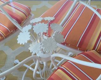 Center flower design on powder-coated table