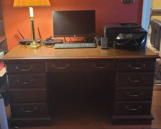 Executive desk, has lock and key, 60" x 30"