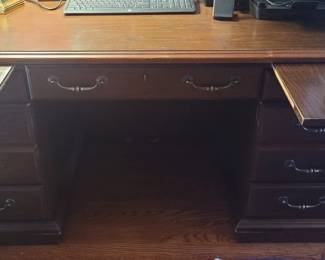 Executive desk, has lock and key, 60" x 30"
