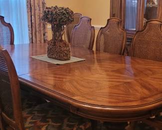 Lovely dining room, Century Dining Table with 10 cane back drop upholstered chairs