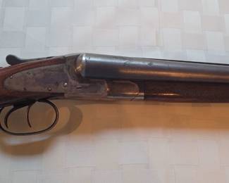 LC Smith 12 gauge double-barrel 1946 Field Grade Serial #735, very clean, has a small crack. PLEASE NOTE:  We are taking bids on the shotgun.  At the conclusion of the Estate Sale, the Winning Bidder will go to the Toano Gun Shop and take and pay for the Background Check before taking possession of the firearm.