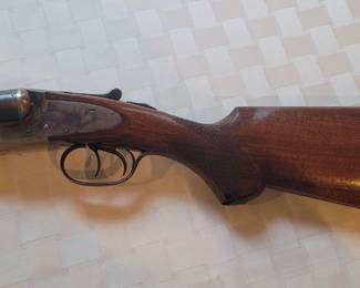 LC Smith 12 gauge double-barrel 1946 Field Grade Serial #735, very clean, has a small crack. PLEASE NOTE:  We are taking bids on the shotgun.  At the conclusion of the Estate Sale, the Winning Bidder will go to the Toano Gun Shop and take and pay for the Background Check before taking possession of the firearm.