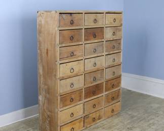 Lot 319 French Oak Apothecary Style Bank of Drawers.