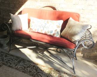 Metal bench with cushions