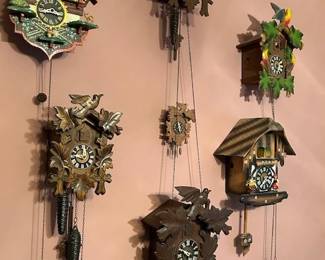 Vintage Cuckoo clocks.  More not pictured. 