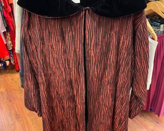 black velvet lined, red crepe opera coat