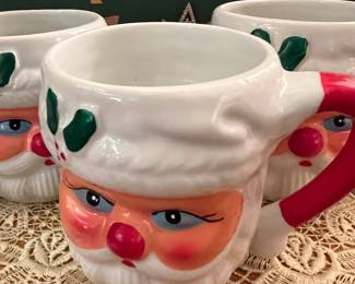 Fun vintage blue eyed Santa mugs