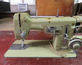 Necchi sewing machine in a full cabinet