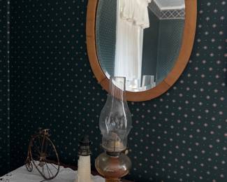 small oval antique mirror