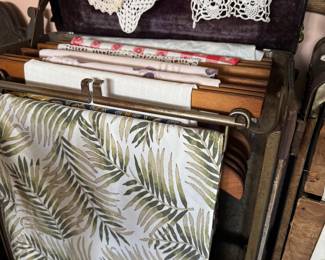 hanging bars in antique trunk