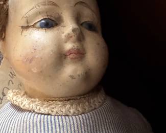 very old antique doll